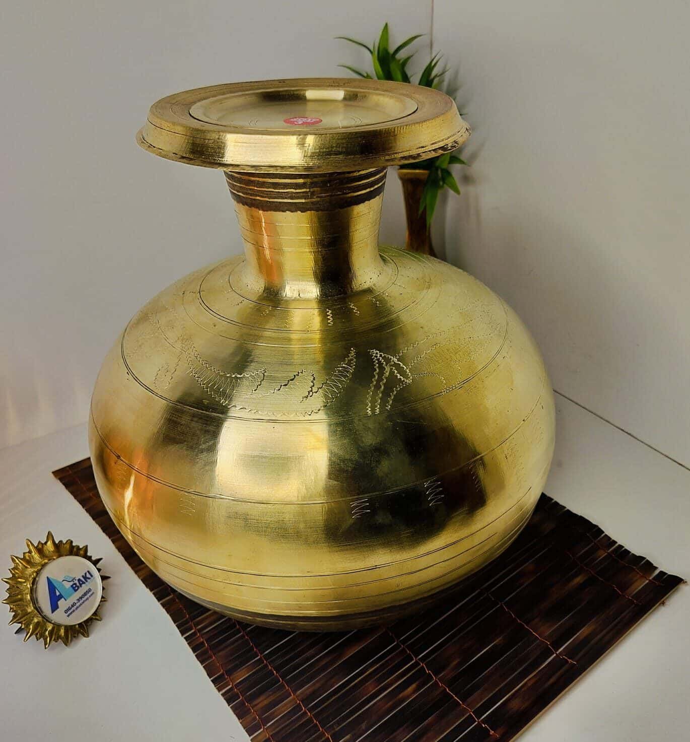 Big Pitol Kolshi with Cover ( পিতলের বড় কলসি ঢাকনা সহ ) 1 Big Pitol Kolshi with Cover ( পিতলের বড় কলসি ঢাকনা সহ )