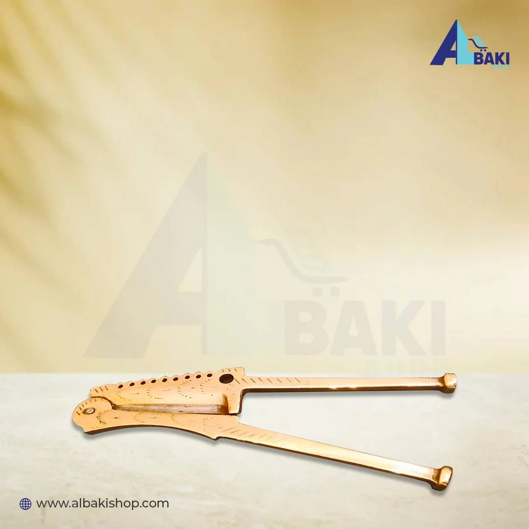 Brass Supari cutter. 1 Brass Supari cutter.